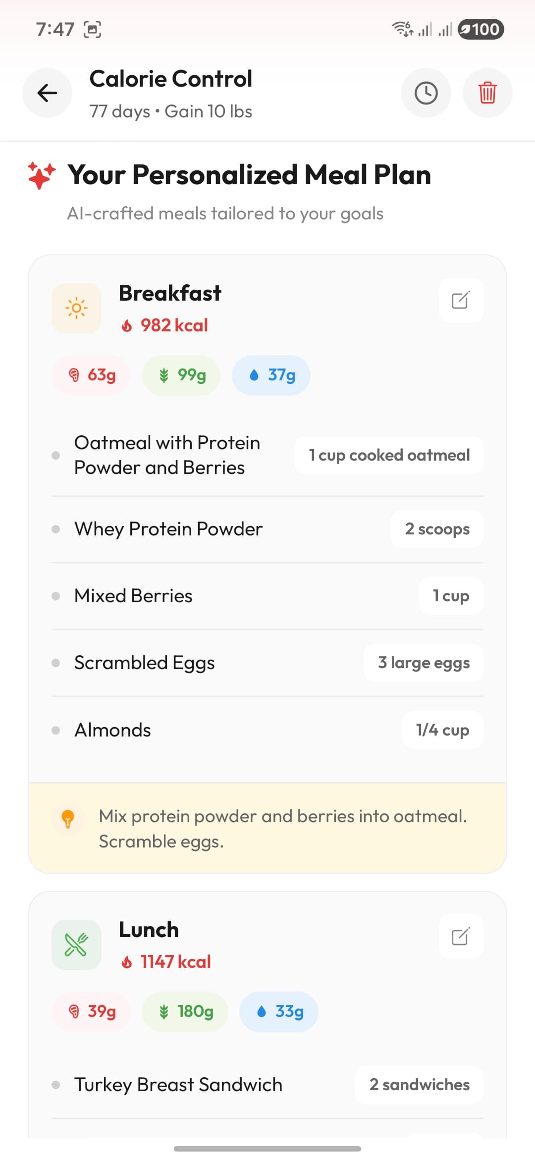 The Caloris meal plan screen showing a generated day of meals with calorie and macro totals